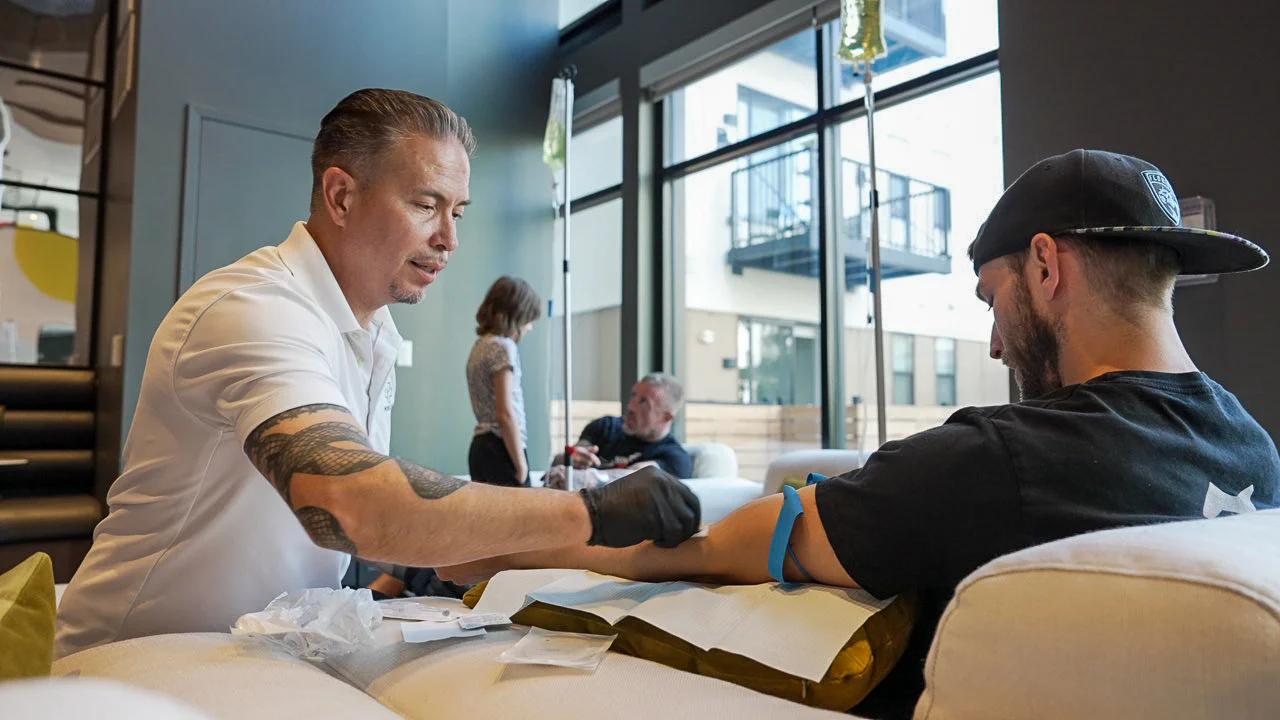 Nurse Cleaning Arm Before IV