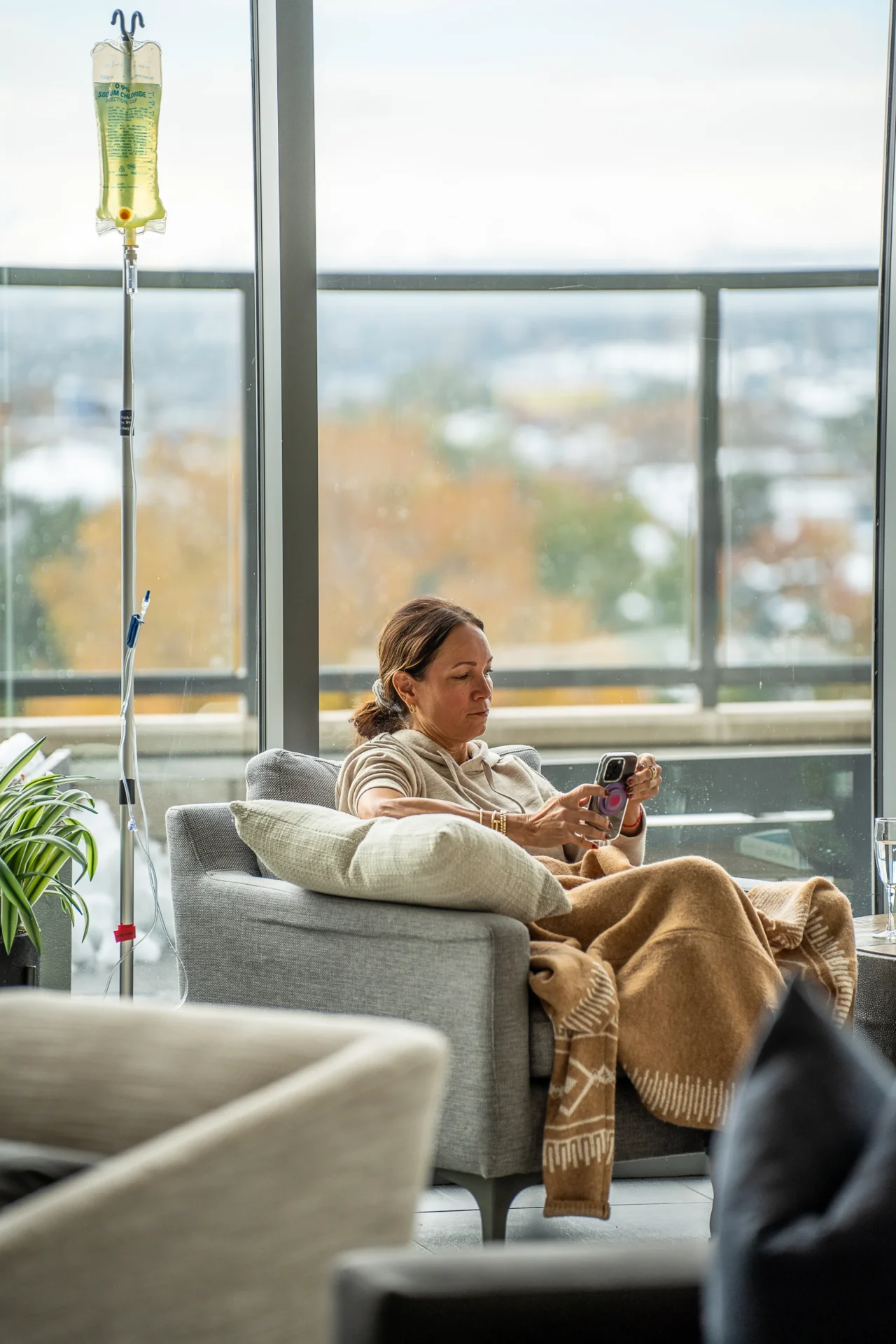 Patient relaxing while getting an IV drip