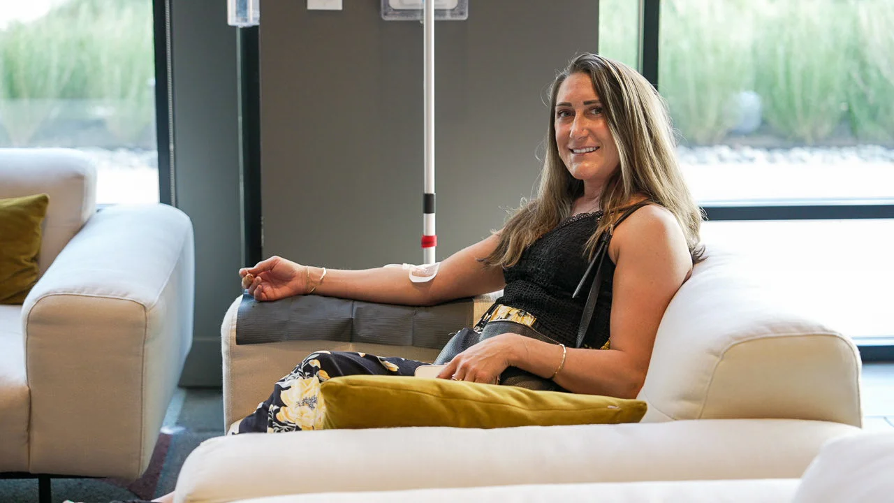 Smiling Client During IV Hydration Treatment