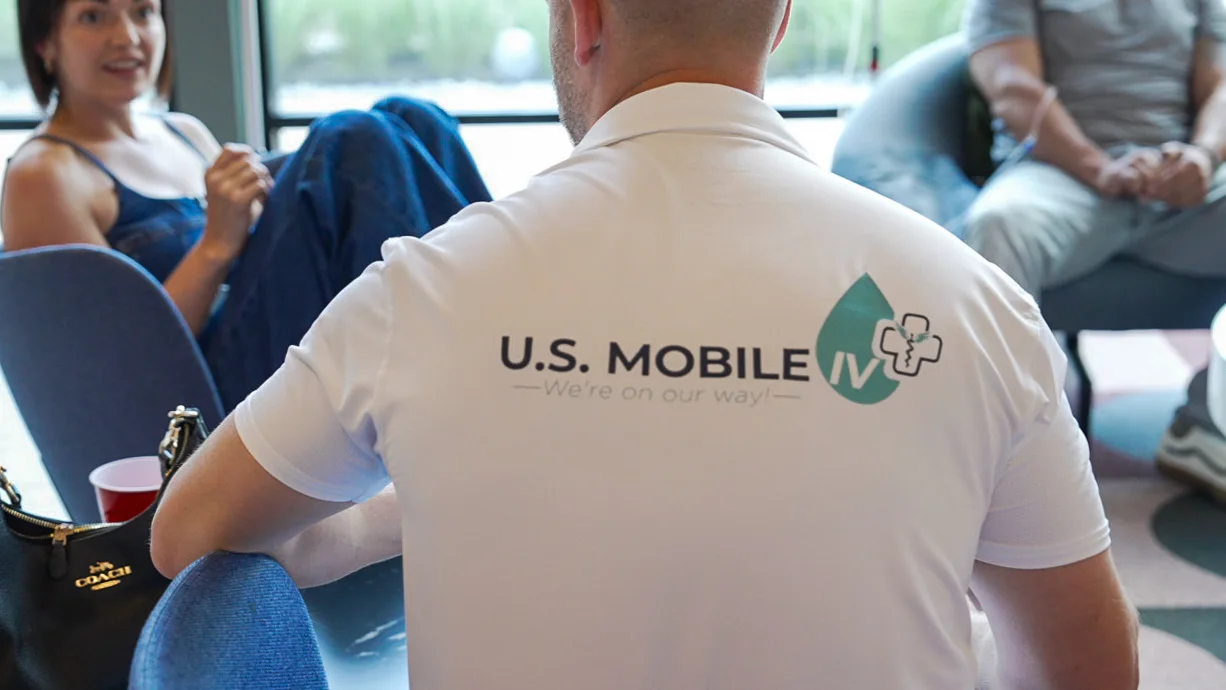 Team Member With US Mobile IV Logo Shirt